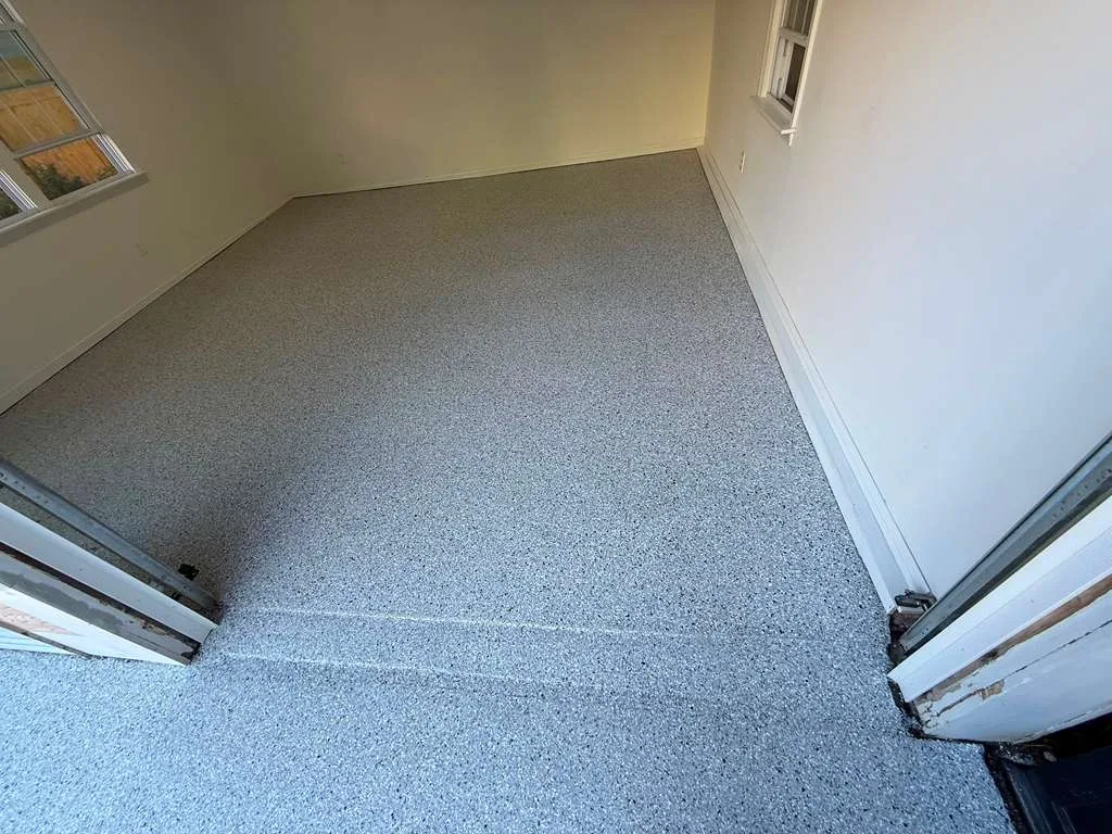 Interior room floor sealed in a light flake finish