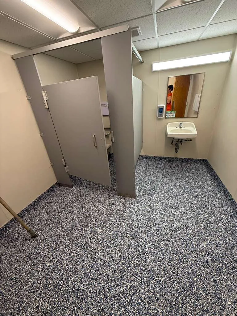Commercial restroom floor coated and waterproofed